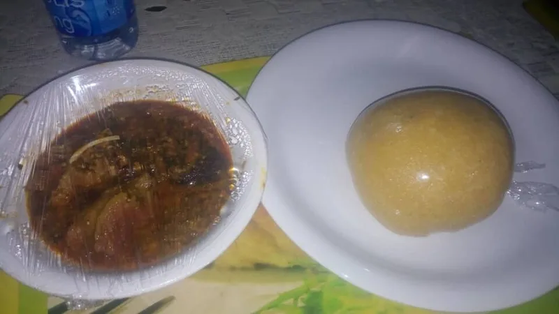 Achu & Yellow Soup, via Wikimedia Commons
