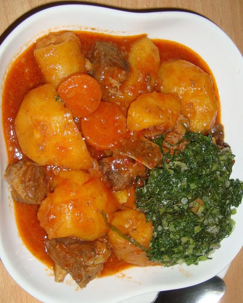 Tigadège Na (Malian Peanut Meat Stew), via Wikimedia Commons